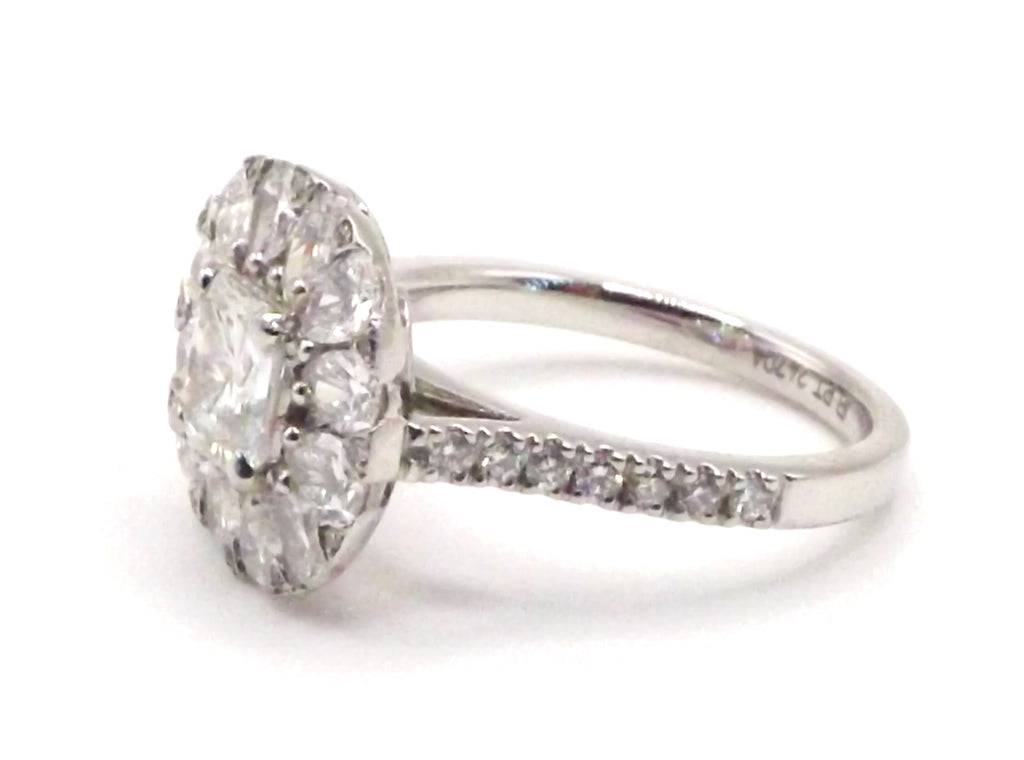 Platinum set Pear Radiant and Round cut Diamond Cluster Ring