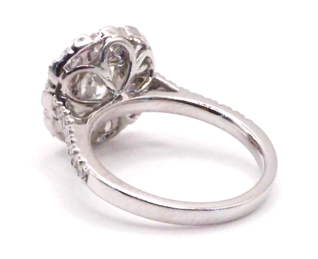 Platinum set Pear Radiant and Round cut Diamond Cluster Ring