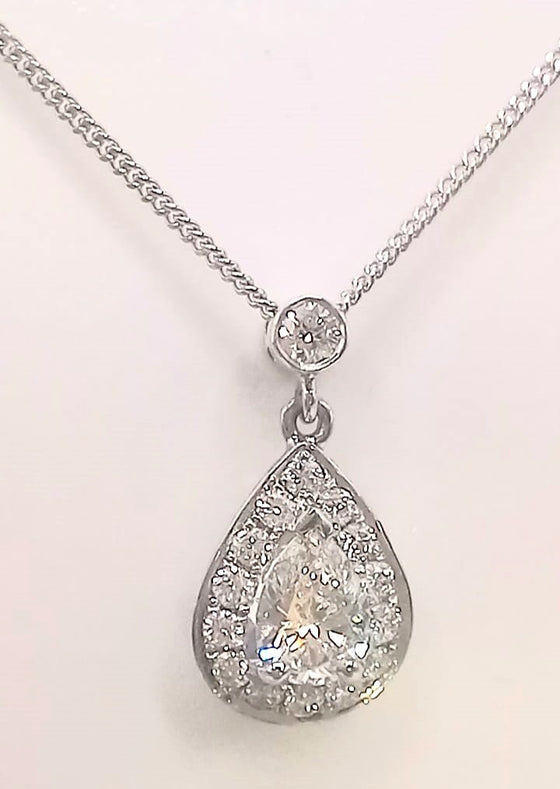 18 ct White Gold necklace with 0.51 ct pear cut centre diamond and 0.30 ct round diamonds