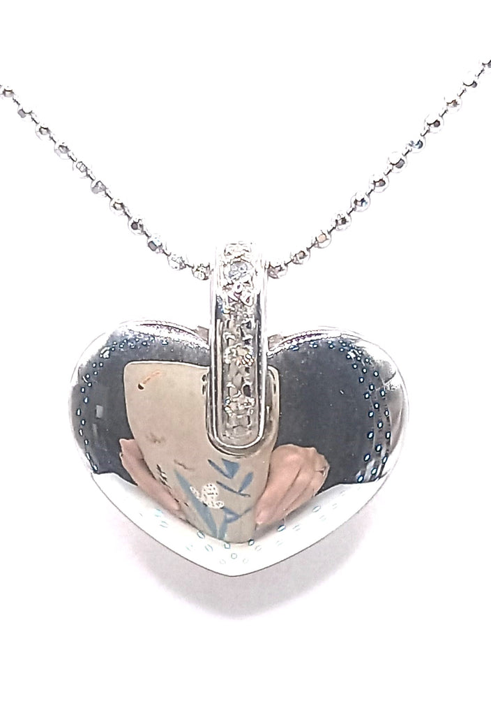 18 ct White Gold and diamond polished heart pendant