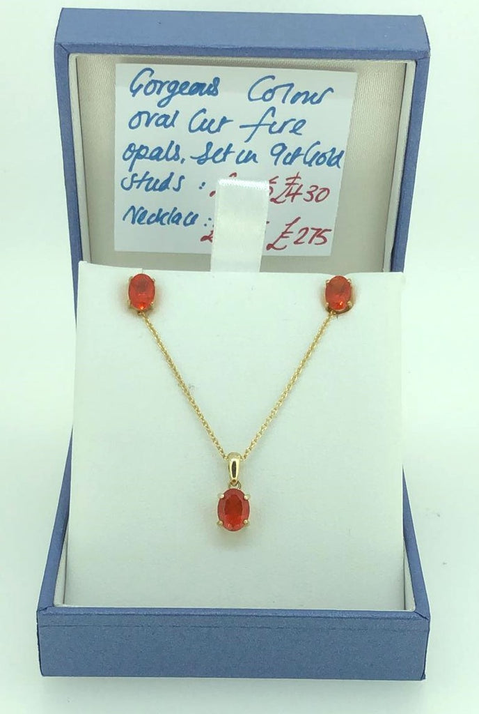 9 ct Yellow Gold earring and necklace set with fire opals