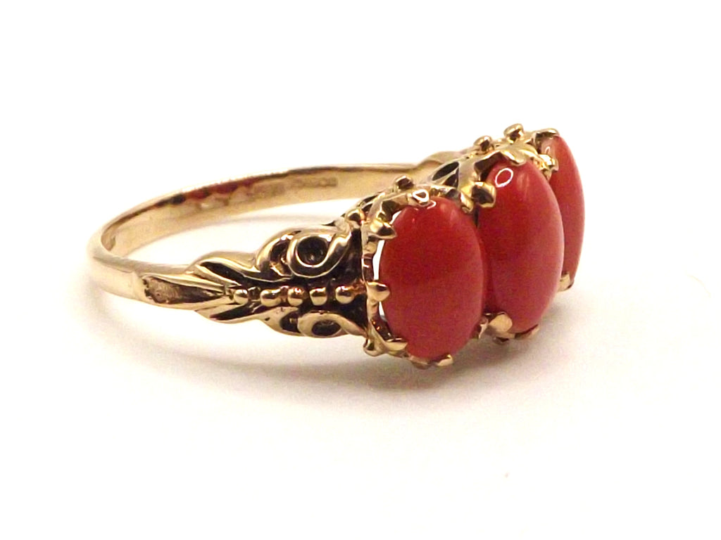 9 ct Yellow Gold trilogy coral ring