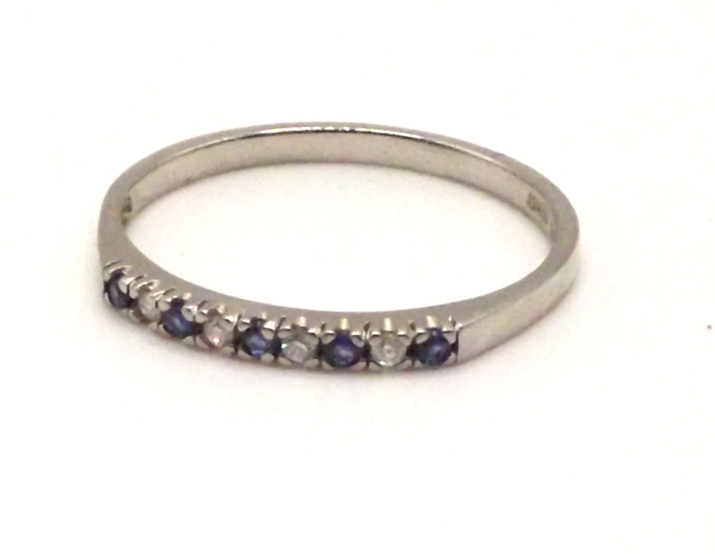 Palladium half eternity ring with sapphires and diamonds