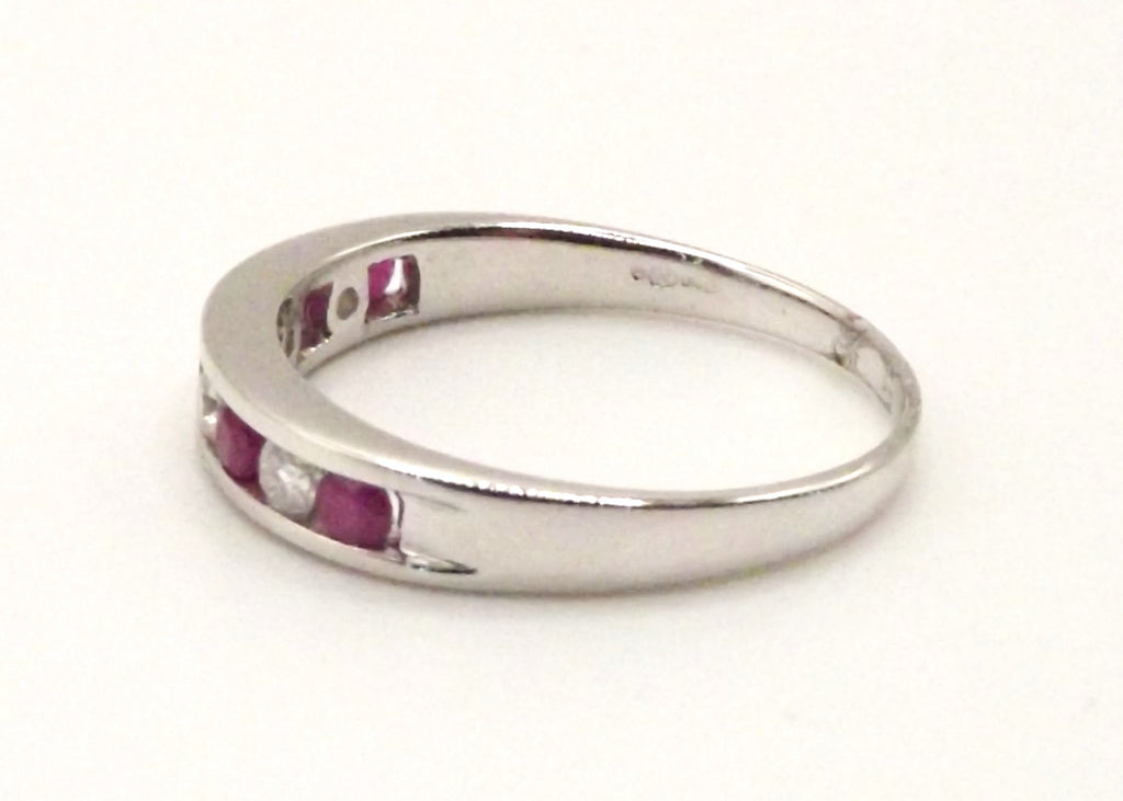 9 ct White Gold half eternity ring with rubys