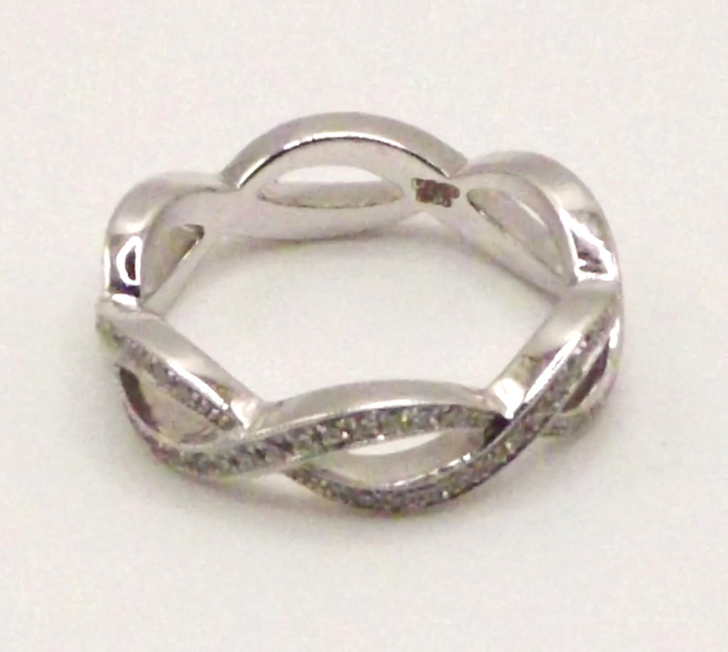 18 ct White Gold crossover ring with milgrain diamond set