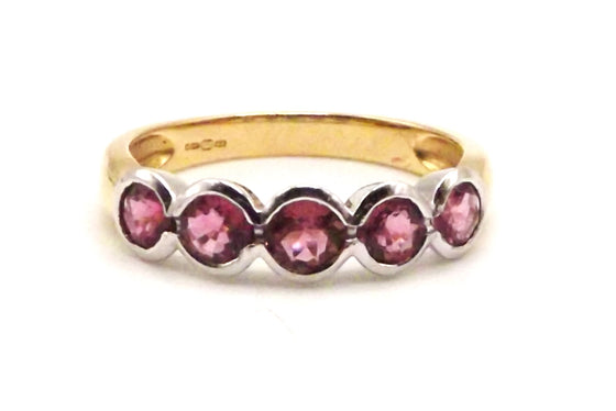 18 ct Gold ring with a set of pink touramalines