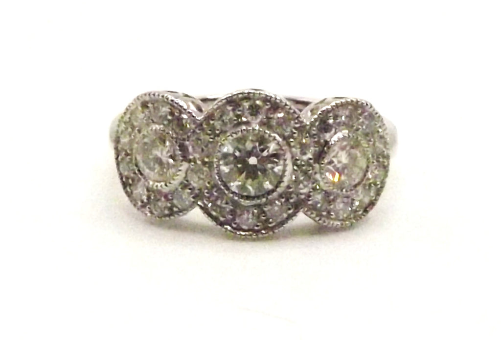 18 ct White Gold ring with triple cluster of a total of 1.0 ct diamonds